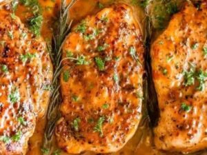 Grilled Chicken Tenderloin Grilled with lemon thyme and olive oil, served with mashed potatoes and grilled  vegetables.