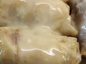 Cabbage rolls Spiced beef with rice, parsley, dill, mint, onion, olive oil, and Greek egg lemon  sauce.