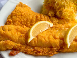 Cod Fish Fillets Cod Fish Fillets,wilde from Alaska served with garlic mashed potatoes, baby carrots and cherry tomatoes in a zesty lemon butter sauce.